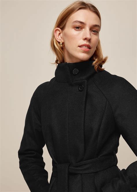 Black funnel neck coat womenpercent27s - It's offered in an enduring deep-black shade that grounds the richer colors in the collection. CRAFT Our team of specialist artisans expertly knitted this piece with racking- and cardigan-stitched panels that lend it texture, depth and subtle contrast. 100% RWS Wool / Dry clean Back length of size M is 25.59 / Model wears a size M.